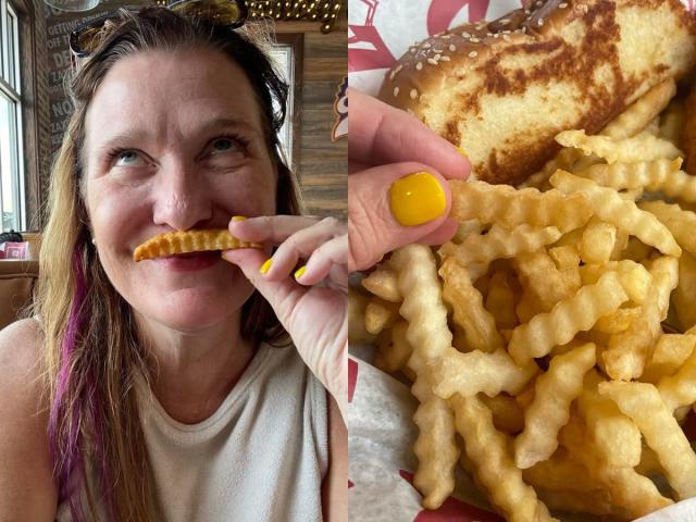 woman eating french fries