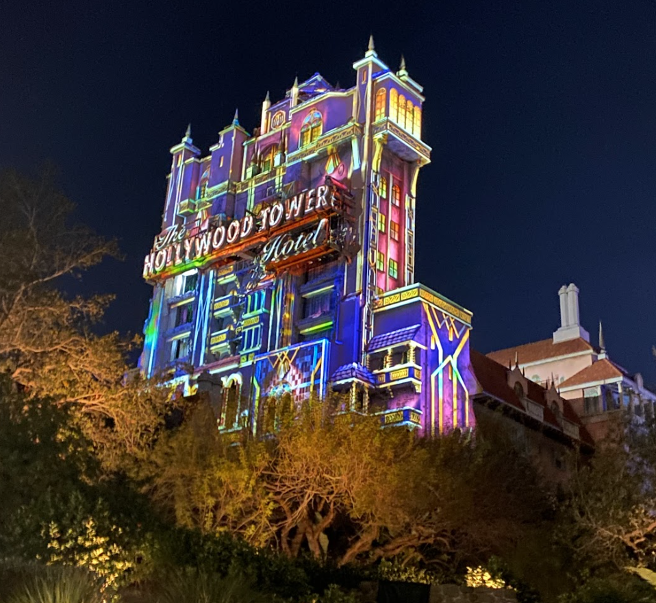 Before my favorite fake snow falls on Sunset Boulevard in Hollywood Studios, the Tower of Terror has a special holiday projection show that runs through four different scenes: a gingerbread tower with the Muppets, A Toy Story Hollywood Toy Hotel, A Frozen inspired winter scene, and Mickey and Minnie a la Mickey's Christmas Carol.