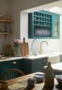 <p>Small spaces shouldn't necessarily mean paring back your design personality. Fewer pieces and minimal decoration will create a more open environment, but kitchens are often so functional that they require a bit of <a href="https://www.housebeautiful.com/uk/decorate/kitchen/a40976814/adding-character-new-kitchen/" rel="nofollow noopener" target="_blank" data-ylk="slk:character;elm:context_link;itc:0;sec:content-canvas" class="link ">character</a> to soften them. If you are really stretched for space, adding colour to your surfaces is the best way to achieve this.</p><p>Pictured: <a href="https://www.oliveandbarr.com" rel="nofollow noopener" target="_blank" data-ylk="slk:Bespoke kitchen by Olive & Barr;elm:context_link;itc:0;sec:content-canvas" class="link ">Bespoke kitchen by Olive & Barr</a></p>