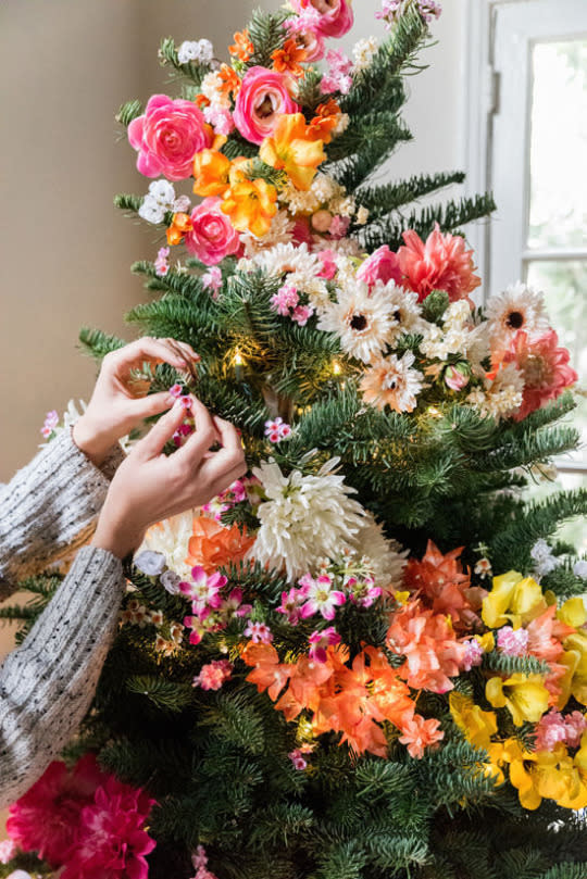 Deck the halls with boughs of … bright flowers?