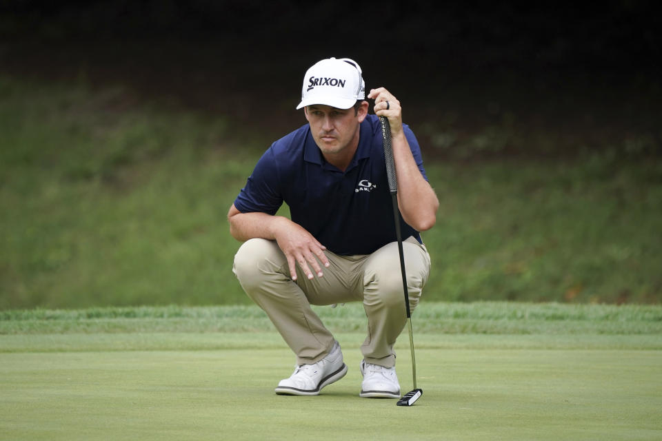 Andrew Putnam of the United States lines up a putt on the third green during the third round of the Zozo Championship golf tournament at Accordia Golf Narashino Country Club on Saturday, Oct. 15, 2022 in Inzai, Chiba Prefecture, east of Tokyo, Japan. (AP Photo/Tomohiro Ohsumi)