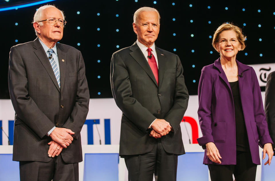 2020 presidential candidates Senator Bernie Sanders, an independent from Vermont, from left, former U.S. Vice President Joe Biden and Senator Elizabeth Warren, a Democrat from Massachusetts, and arrive on stage for the Democratic presidential candidate debate in Westerville, Ohio on Oct. 15, 2019. (Photo: Allison Farrand/Bloomberg via Getty Images)