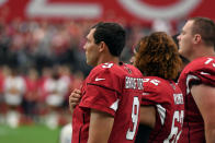 <p>Quarterback Sam Bradford #9 stands with teammate center Daniel Munyer #62 of the Arizona Cardinals for the National Anthem before the game against the Washington Redskins at State Farm Stadium on September 9, 2018 in Glendale, Arizona. (Photo by Norm Hall/Getty Images) </p>