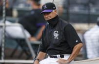 Colorado Rockies manager Bud Black jokes with players during the baseball team's practice Sunday, July 12, 2020, in Denver. (AP Photo/David Zalubowski)