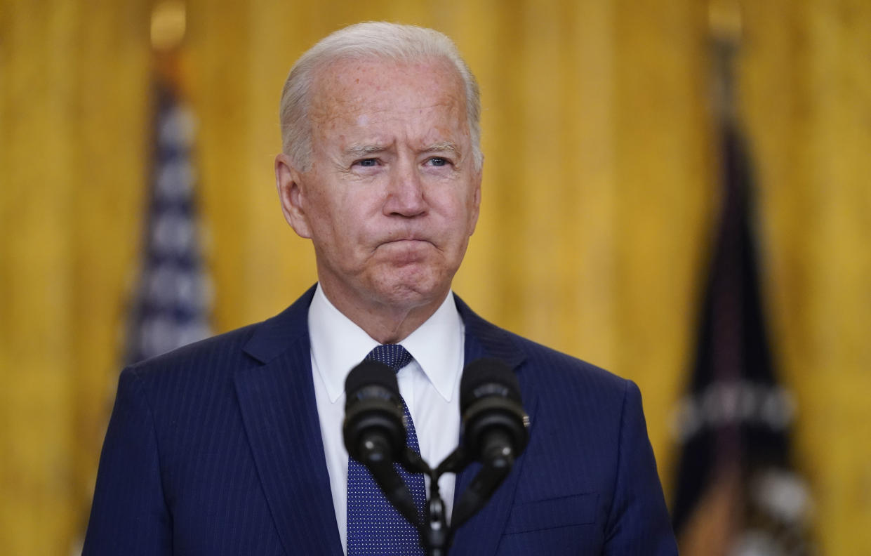 President Joe Biden pauses as he speaks about the bombings at the Kabul airport that killed at least 12 U.S. service members, from the East Room of the White House, Thursday, Aug. 26, 2021, in Washington. (Evan Vucci/AP)