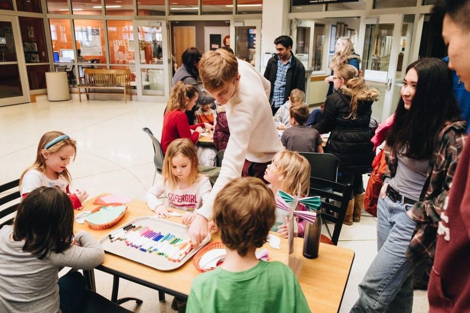 A teen volunteers at a children’s program at the downtown library. Teen volunteer orientation is 7-8 p.m. Monday in meeting room 1C at the downtown library.