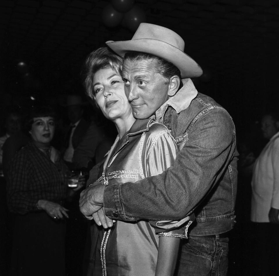 <p>Douglas and wife Buydens at a party in Los Angeles. </p>