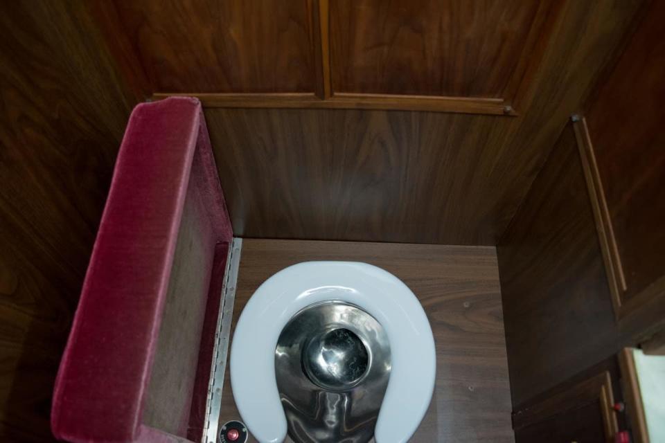 The velvet-topped toilet seat on board the Lockheed Jetstar - Credit: Liveauctioneers.com