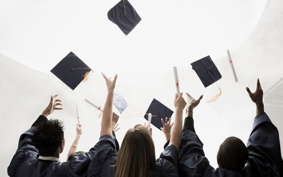 Soaring: some graduates are being charged high penalty interest rates on their loans - Getty Images Contributor