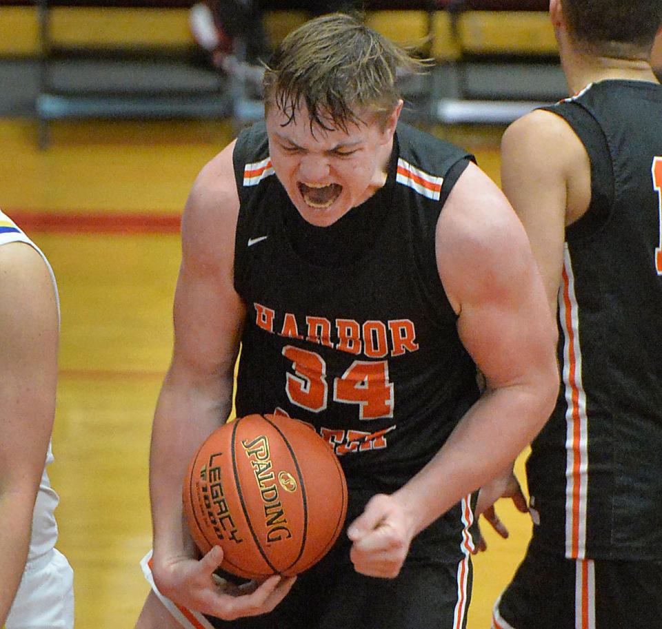 Harbor Creek High School junior Nick Krahe reacts after scoring a basket and getting fouled against Seneca during the Fairview Tip-Off Classic on Dec. 11, 2021, in Fairview Township.