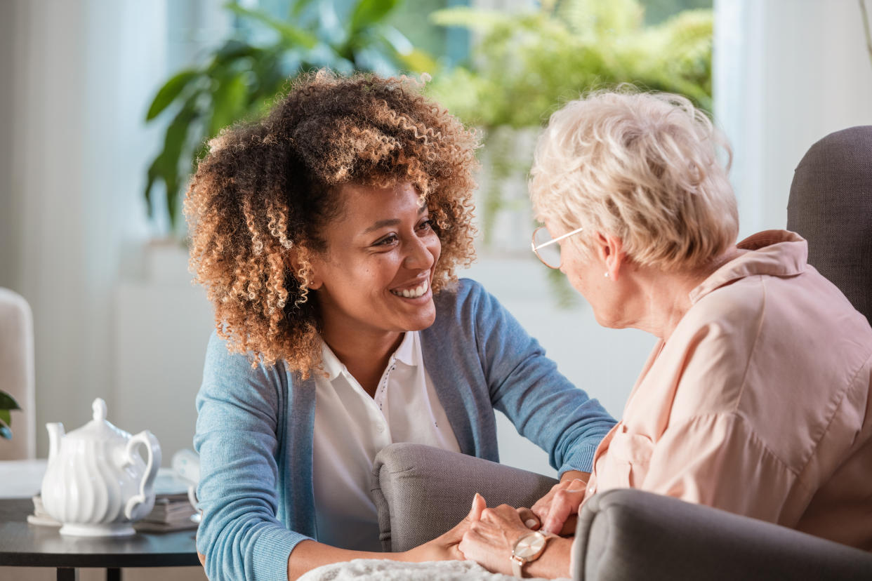 Nurse caring for woman with dementia. (Getty Images)