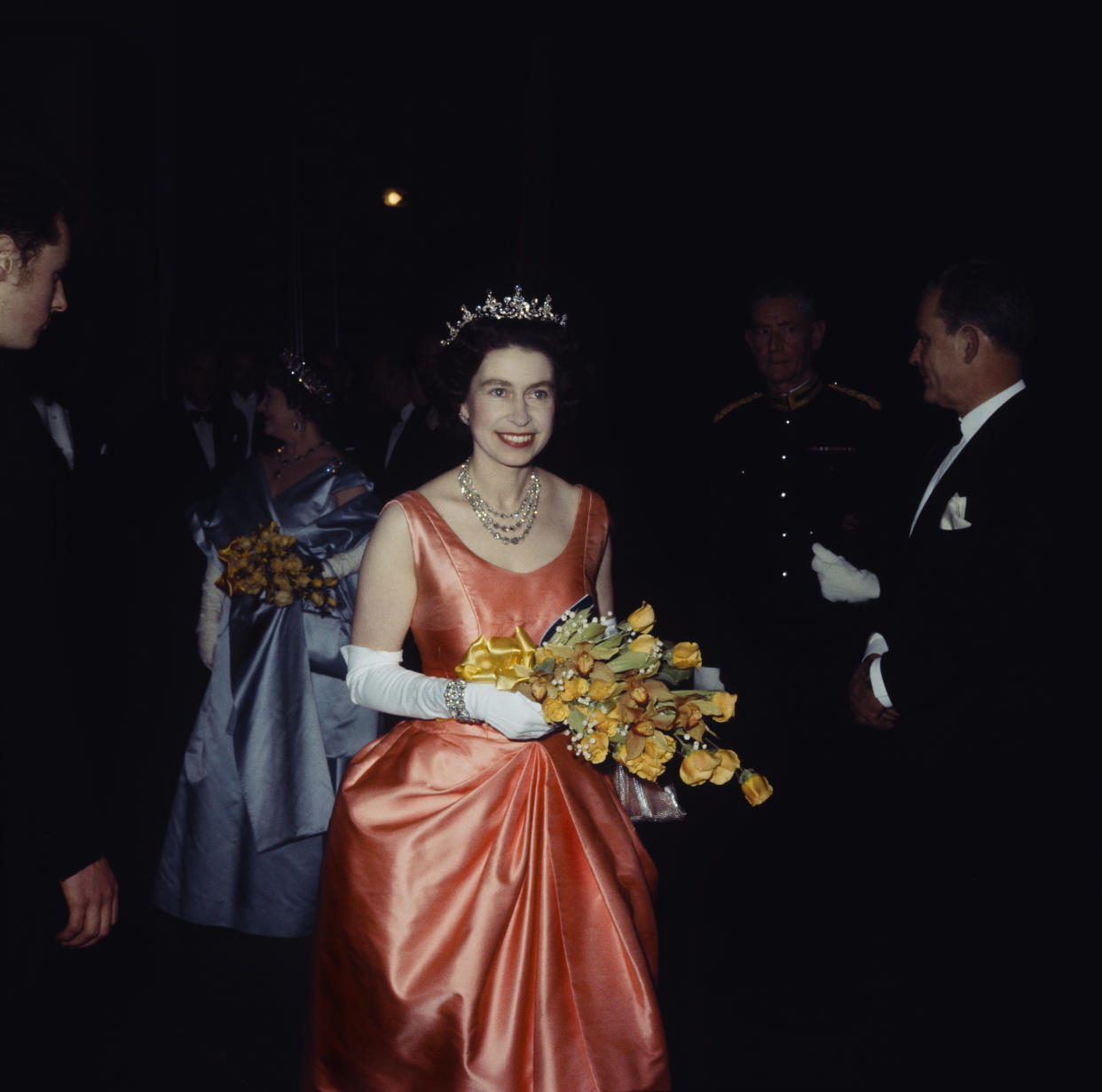 Queen Elizabeth II wearing the George VI Festoon necklace at the Royal Academy of Dramatic Art (RADA) in 1964