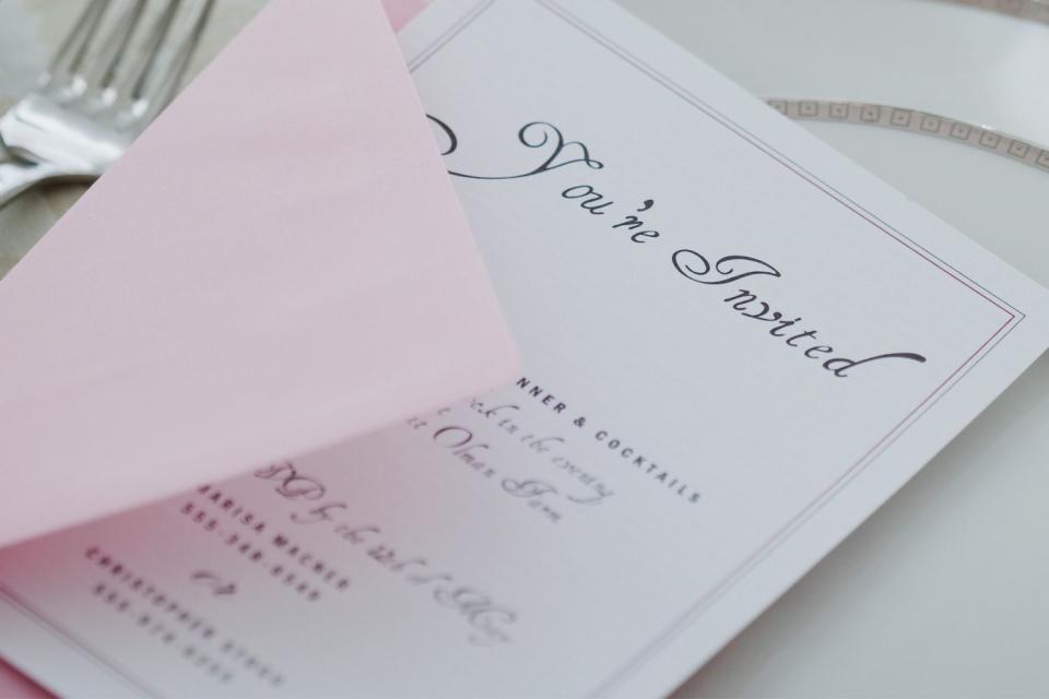 <p>Getty</p> Stock photo of a wedding invitation