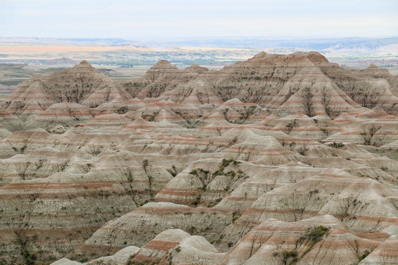 Rock formations in the park. - Photo: <a class="link " href="https://en.wikipedia.org/wiki/Badlands_National_Park#/media/File:MK00609_Badlands.jpg" rel="nofollow noopener" target="_blank" data-ylk="slk:Wikimedia Commons;elm:context_link;itc:0;sec:content-canvas">Wikimedia Commons</a>
