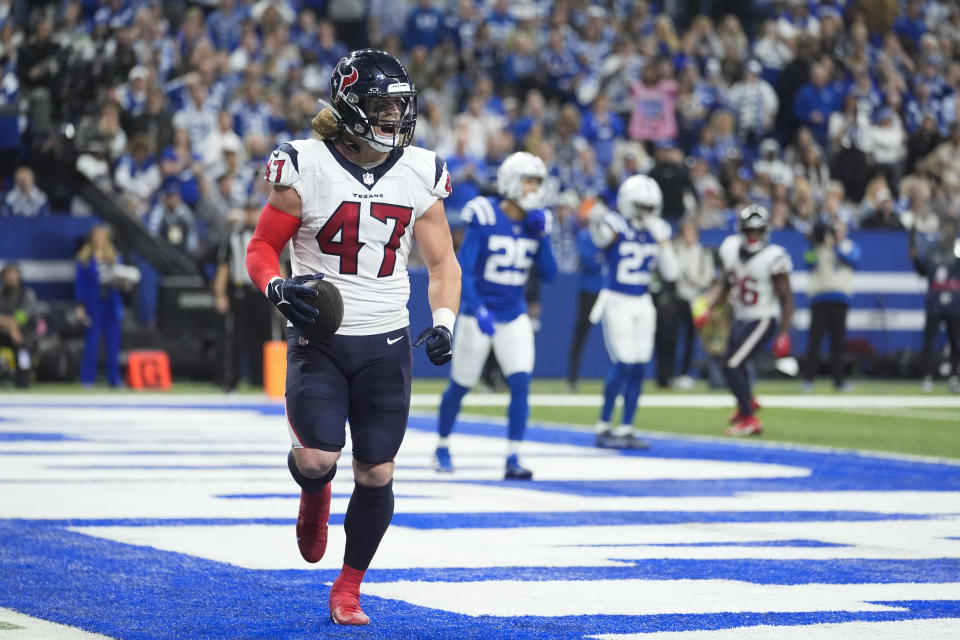 Houston Texans fullback Andrew Beck (47) celebrates after catching a touchdown during the first half of an NFL football game against the Indianapolis Colts, Saturday, Jan. 6, 2024, in Indianapolis. (AP Photo/Michael Conroy)