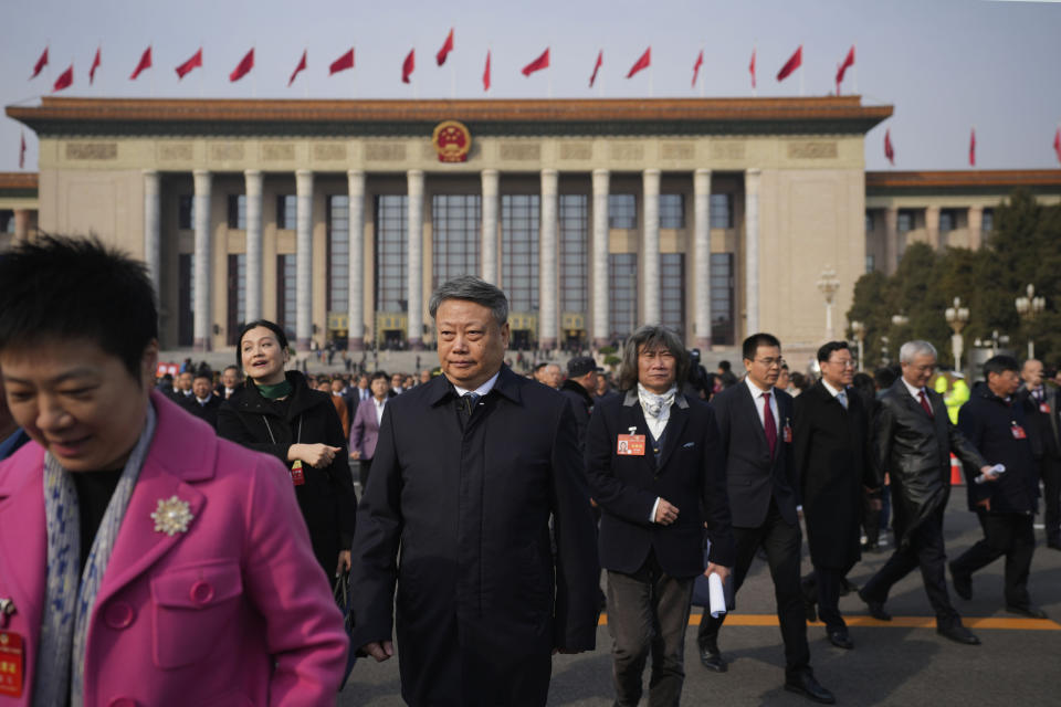 Delegates leave after the closing session of the Chinese People's Political Consultative Conference (CPPCC) held in the Great Hall of the People in Beijing, China, Sunday, March 10, 2024. The CPPCC is an advisory body to the National People's Congress which will close Monday. (AP Photo/Tatan Syuflana)