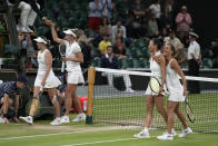 Barbora Strycova of the Czech Republic, right, and Taiwan's Hsieh Su-Wei, second right, celebrate after beating Australia's Storm Hunter and Belgium's Elise Mertens to win the final of the women's doubles on day fourteen of the Wimbledon tennis championships in London, Sunday, July 16, 2023. (AP Photo/Alastair Grant)