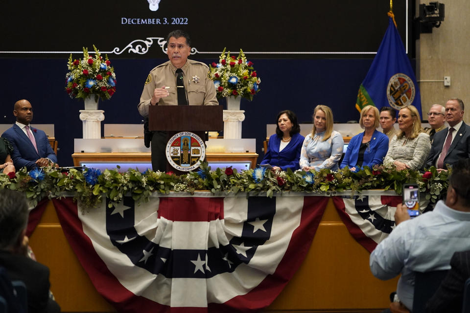 New Los Angeles County Sheriff Robert Luna, at podium, speaks after being sworn in as the 34th Los Angeles Sheriff during a ceremony in Los Angeles, Saturday, Dec. 3, 2022. (AP Photo/Damian Dovarganes)