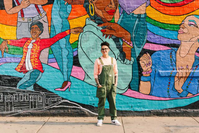 Lucy Hewett Sam Kirk stands in front of her mural Fierce, in the Pilsen neighborhood.