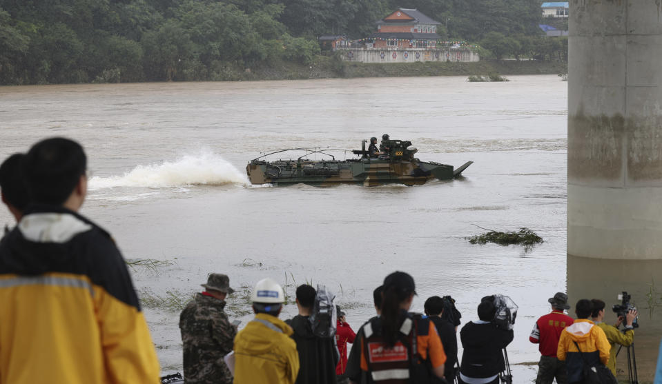 A South Korean Marine's assault amphibious vehicle is mobilized to search for missing people in the Sam River in Yecheon, South Korea, Tuesday, July 18, 2023. Rescuers continued their searches Tuesday for people still missing in landslides and other incidents caused by more than a week of torrential rains. (Kim Dong-min/Yonhap via AP)