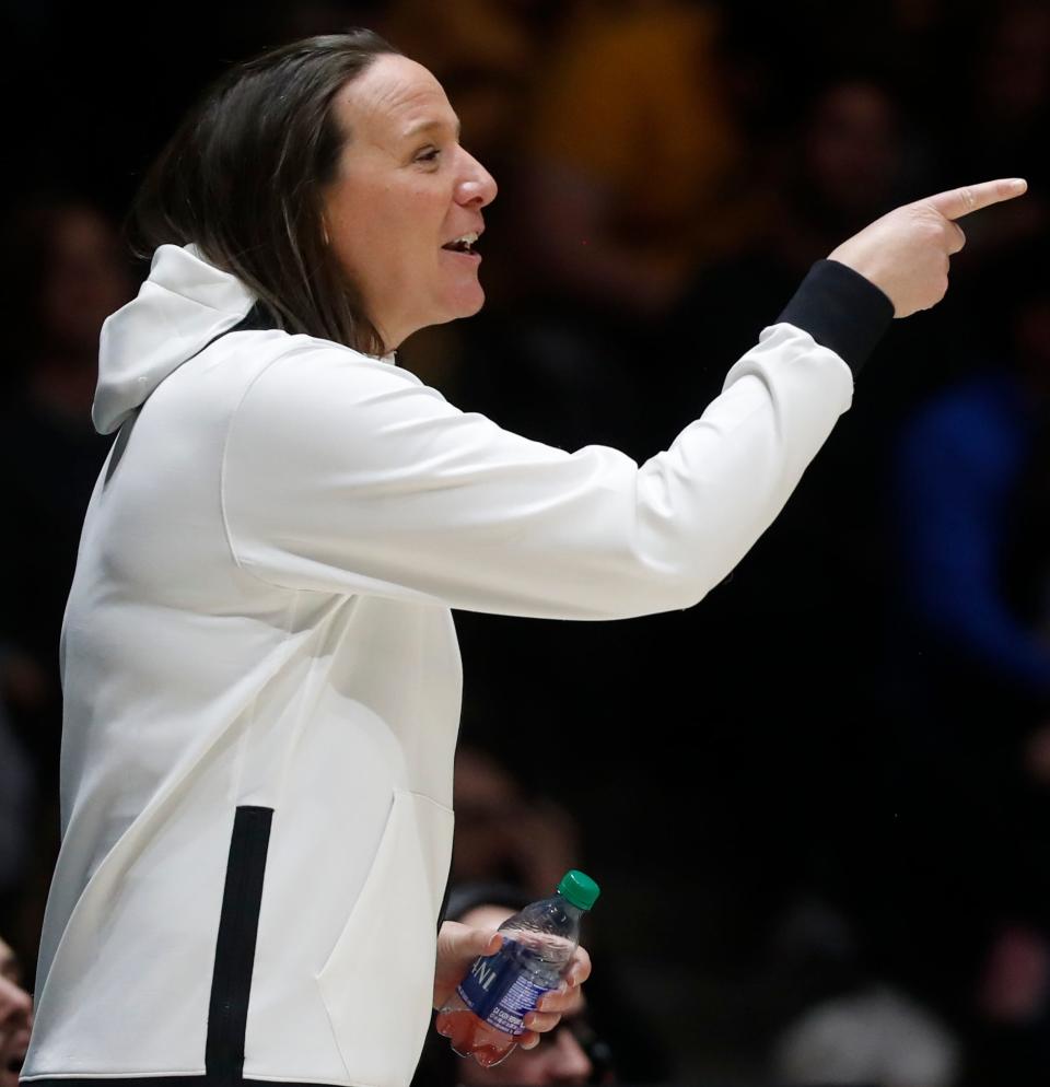 Purdue Boilermakers head coach Katie Gearlds yells down court during the NCAA women’s basketball game against the Iowa Hawkeyes, Wednesday, Jan. 10, 2024, at Mackey Arena in West Lafayette, Ind.