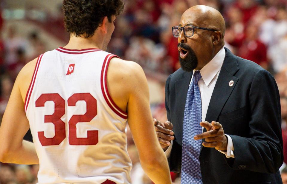 Indiana Head Coach Mike Woodson talks with Trey Galloway (32) during the second half of the Indiana versus Nebraska men's basketball game at Simon Skjodt Assembly Hall on Wednesday, Feb. 21, 2024.
