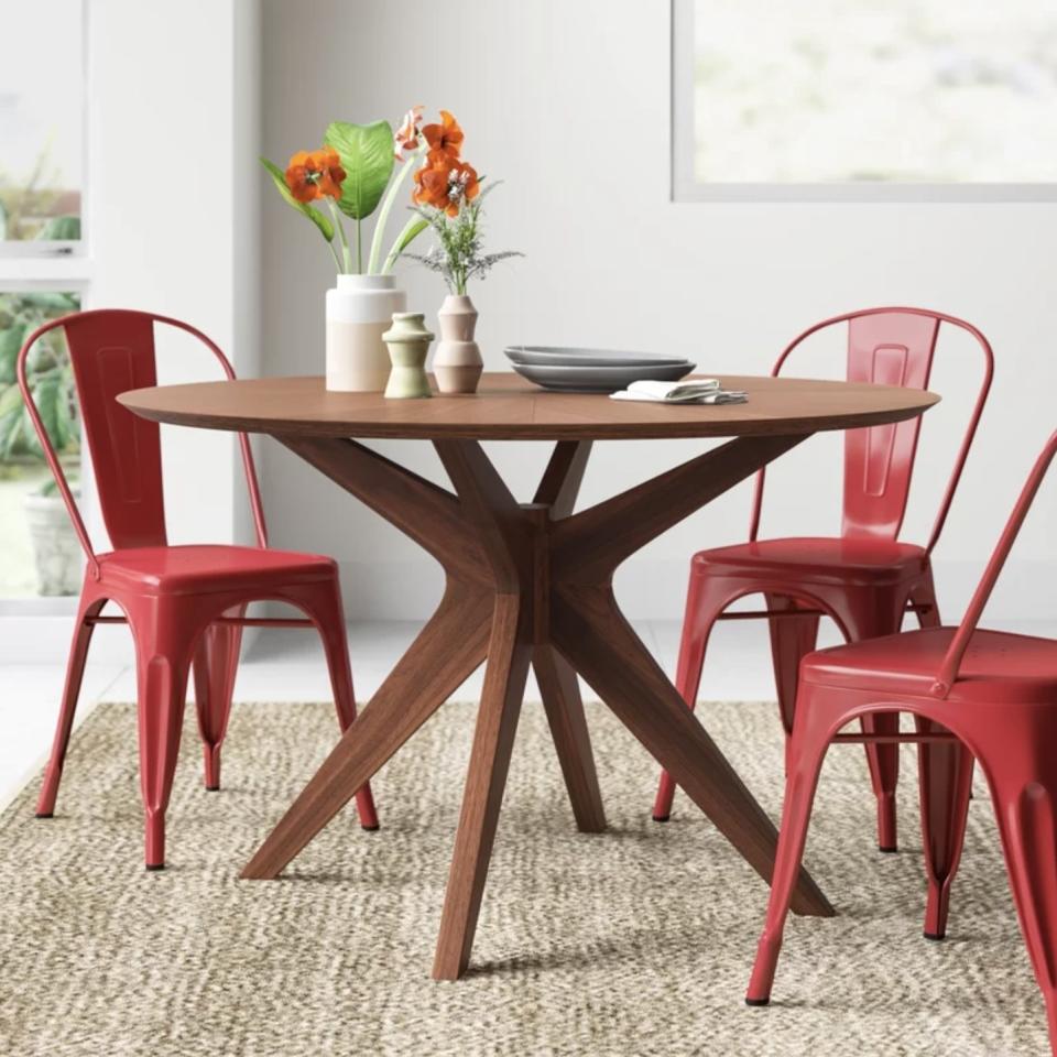 It works perfectly for smaller living spaces and looks great with up to four chairs.<br /><br /><strong>Promising review:</strong> "I love this table! Very sturdy and stable. I like how the top is not shiny so it won&rsquo;t scratch as easily and it doesn&rsquo;t create any glare from the light above." &mdash; <a href="https://go.skimresources.com?id=38395X987171&amp;xs=1&amp;xcust=-HPWayDaySale4-28-21-60896f93e4b09cce6c197126&amp;url=https%3A%2F%2Fwww.wayfair.com%2Ffurniture%2Fpdp%2Fallmodern-larkin-solid-wood-dining-table-w004143332.html" target="_blank" rel="noopener noreferrer">Heather</a><br /><br /><strong>Price:</strong> <a href="https://go.skimresources.com?id=38395X987171&amp;xs=1&amp;xcust=-HPWayDaySale4-28-21-60896f93e4b09cce6c197126&amp;url=https%3A%2F%2Fwww.wayfair.com%2Ffurniture%2Fpdp%2Fallmodern-larkin-solid-wood-dining-table-w004143332.html" target="_blank" rel="nofollow noopener noreferrer" data-skimlinks-tracking="5938996" data-vars-affiliate="CJ" data-vars-campaign="31WaydaySale-Hernandez-04-28-21-5938996/https://www.wayfair.com/furniture/pdp/allmodern-larkin-solid-wood-dining-table-w004143332.html" data-vars-href="https://www.anrdoezrs.net/links/8209452/type/dlg/sid/31WaydaySale-Hernandez-04-28-21-5938996/https://www.wayfair.com/furniture/pdp/allmodern-larkin-solid-wood-dining-table-w004143332.html" data-vars-link-id="16676886" data-vars-price="" data-vars-product-id="21102555" data-vars-product-img="https://secure.img1-fg.wfcdn.com/im/98613384/resize-h800-w800%5Ecompr-r85/8909/89099402/Larkin+Solid+Wood+Dining+Table.jpg" data-vars-product-title="Larkin Solid Wood Dining Table" data-vars-redirecturl="https://www.wayfair.com/furniture/pdp/allmodern-larkin-solid-wood-dining-table-w004143332.html" data-vars-retailers="wayfair" data-ml-dynamic="true" data-ml-dynamic-type="sl" data-orig-url="https://www.anrdoezrs.net/links/8209452/type/dlg/sid/31WaydaySale-Hernandez-04-28-21-5938996/https://www.wayfair.com/furniture/pdp/allmodern-larkin-solid-wood-dining-table-w004143332.html" data-ml-id="12">$459.99</a> (originally $897; available in four colors)<br /><br /><i>See more kitchen and dining furniture <a href="https://go.skimresources.com?id=38395X987171&amp;xs=1&amp;xcust=-HPWayDaySale4-28-21-60896f93e4b09cce6c197126&amp;url=https%3A%2F%2Fwww.wayfair.com%2Fdaily-sales%2Fway-day%253a-kitchen-%2526-dining-furniture%7Ee220828.html" target="_blank" rel="noopener noreferrer">from $90</a>.</i>