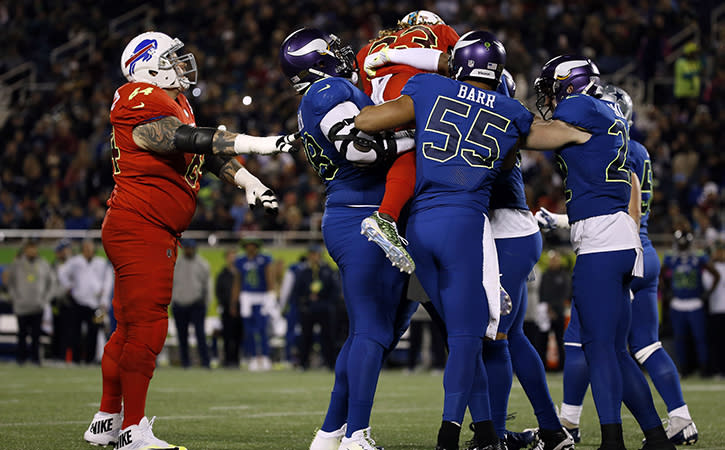 Jan 29, 2017; Orlando, FL, USA; NFC interior lineman Linval Joseph of the Minnesota Vikings (98) , NFC outside linebacker Anthony Barr of the Minnesota Vikings (55) and teammates pick up AFC running back Jay Ajayi of the Miami Dolphins (23) as they tackle him during the second half at Citrus Bowl.AFC defeated the NFC 20-13. Mandatory Credit: Kim Klement-USA TODAY Sports