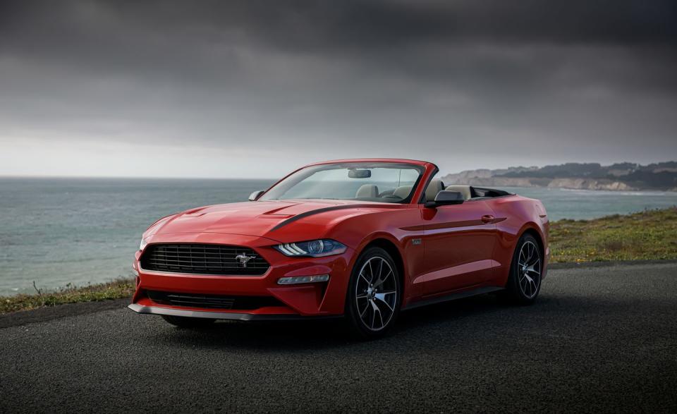 <p>Models with the High Performance package can be identified by their black front splitter, blacked-out grille with an offset Mustang emblem, gray side mirrors, hood stripes, rear spoiler lip, quad exhaust, and trim-specific badges.</p>