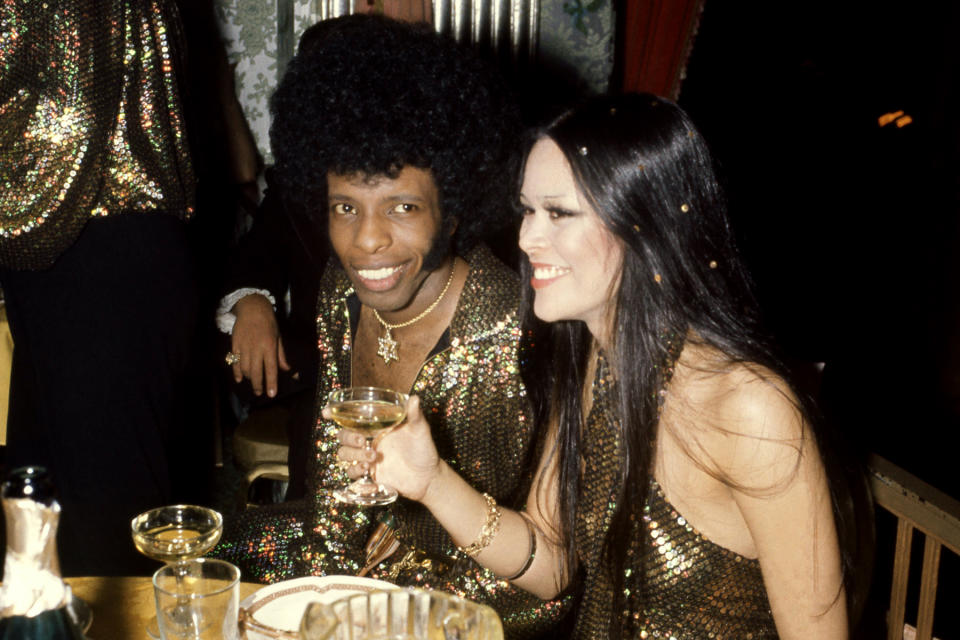 American musician Sly Stone and model-actress Kathy Silva smile during their wedding reception at the Waldorf-Astoria in New York, New York, June 5, 1974. (Photo by Oscar Abolafia/TPLP/Getty Images)