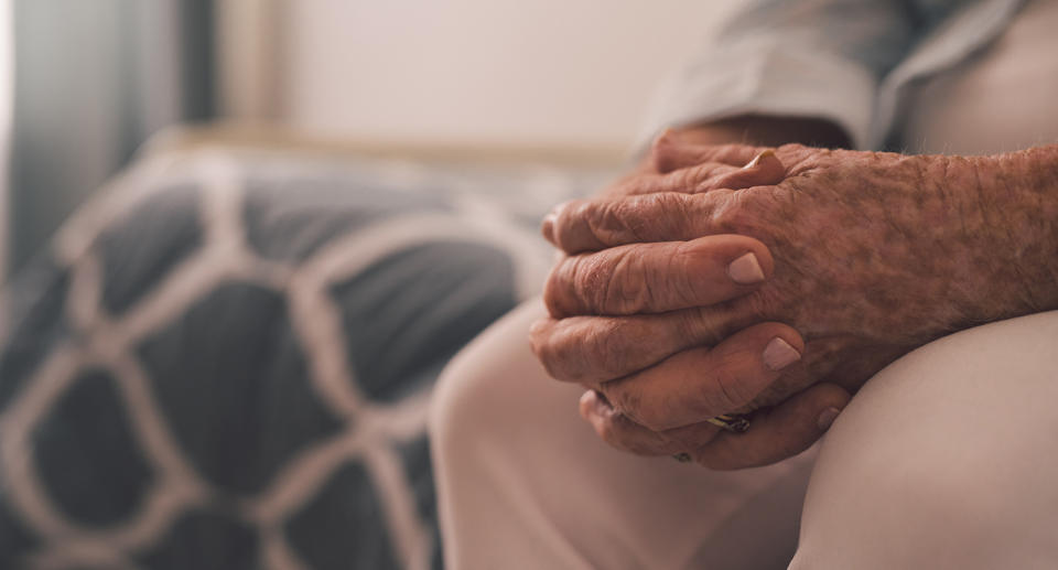 An elderly man's hands close up.