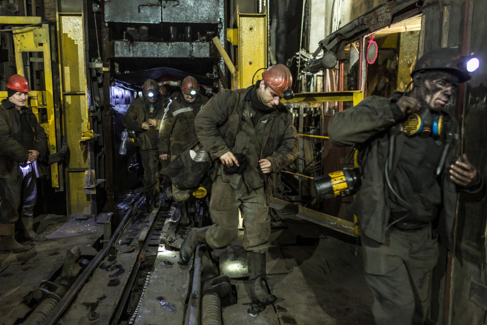 Image: Miners leave the elevator from their shift underground at the Tsentralna coal mine in Toretsk, Donetsk region, Ukraine (Oksana Parafeniuk / for NBC News)