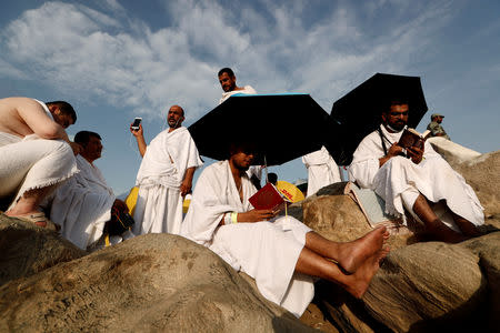 Muslim pilgrims gather on Mount Mercy on the plains of Arafat during the annual haj pilgrimage, outside the holy city of Mecca, Saudi Arabia August 20, 2018. REUTERS/Zohra Bensemra