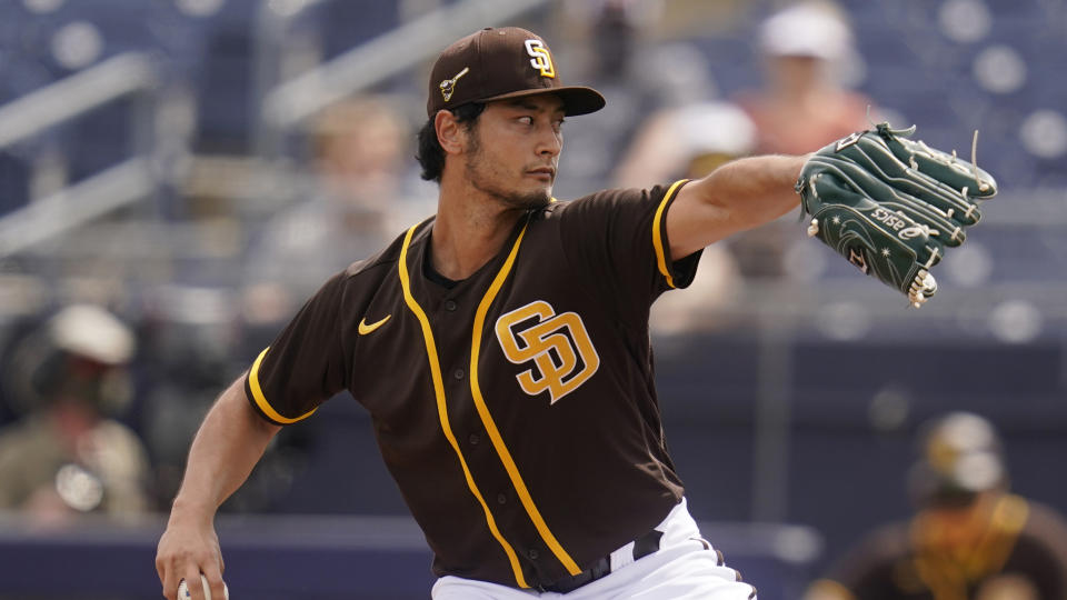 San Diego Padres' Yu Darvish pitches in a spring training baseball game against the Kansas City Royals, Sunday, March 7, 2021, in Peoria, Ariz. (AP Photo/Sue Ogrocki)