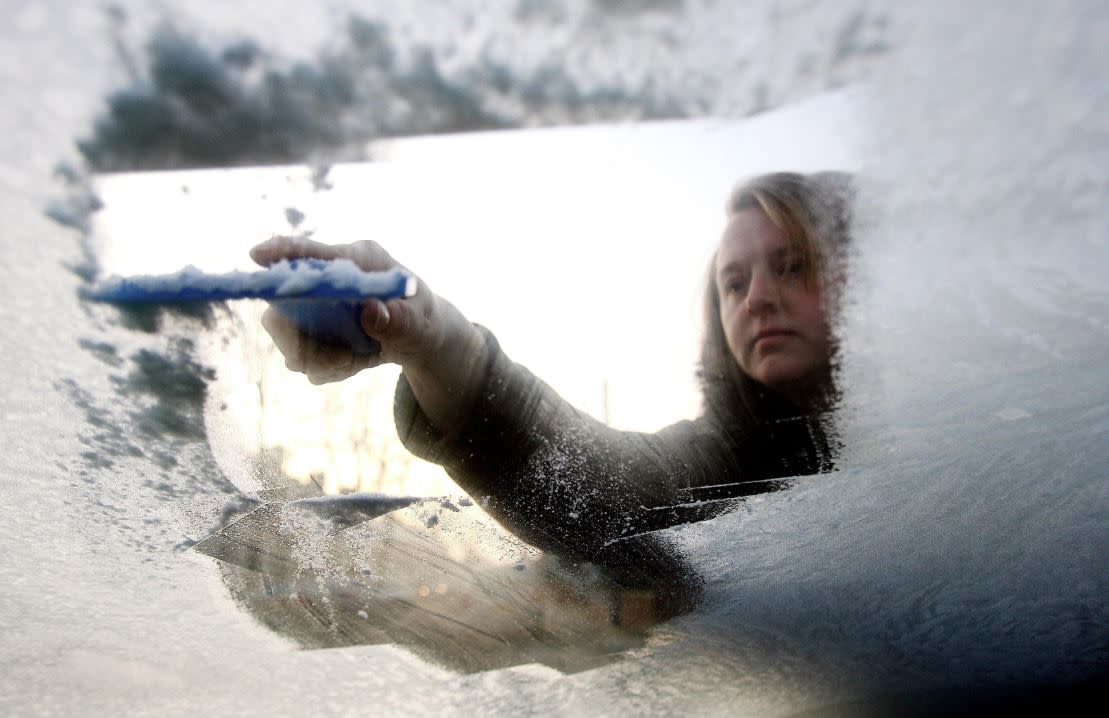 Drivers have been warned to clear windscreens of ice (PA)