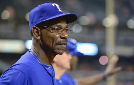 FILE PHOTO: Rangers manager Ron Washington watches his team give up a run to the Orioles in the eighth inning of their MLB American League baseball game in Baltimore