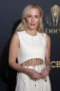 Gillian Anderson poses for photographers as she arrives for the Netflix Celebration of the 73rd Primetime Emmy Awards in central London, Sunday, Sept. 19, 2021. (Photo by Joel C Ryan/Invision/AP)