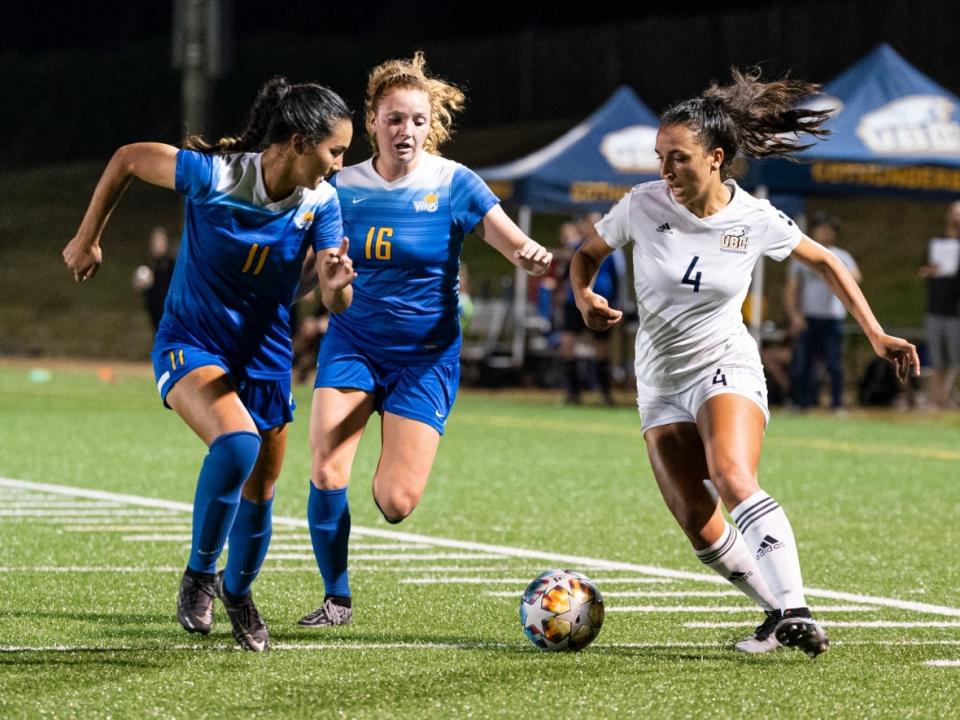 UBC Thunderbirds fullback Sophia Ferreira, right, is excited for the launch of a Canadian women's professional league in 2025. (Submitted by Rich Lam/UBC Thunderbirds - image credit)