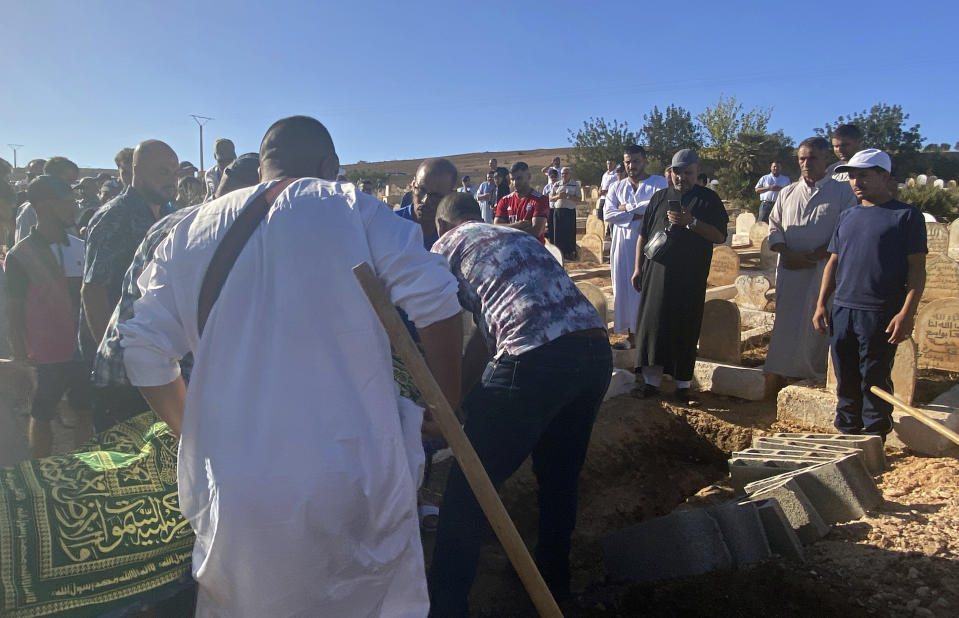 People attend the funeral of Bilal Kissi, who was killed by Algerian forces, in the city of Saaidia, Morocco, Thursday, Aug. 31, 2023. Two men were killed by Algerian forces after they strayed across Morocco’s maritime border with Algeria on water scooters, and a third was detained by Algerian authorities, according to Moroccan media reports.(AP Photo)