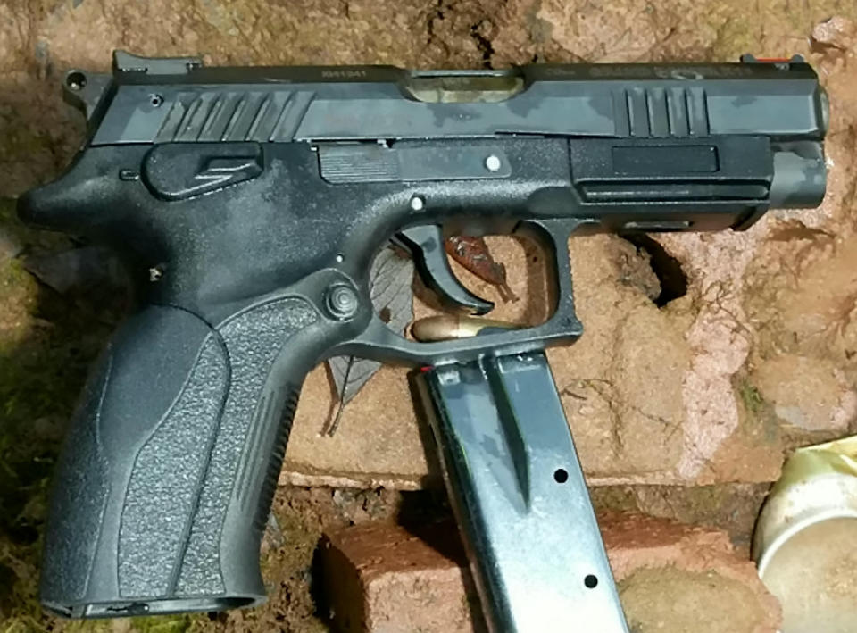 The recovered weapon used in the shooting, a 9mm Luger pistol