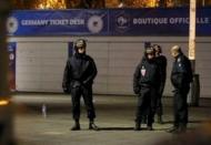 Police stand outside the Stade de France where explosions were reported to have detonated outside the stadium during the France vs German friendly soccer match near Paris, November 13, 2015. REUTERS/Gonazlo Fuentes