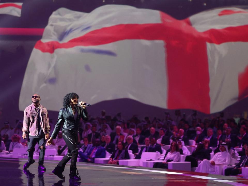 Davido and Trinidad Cardona perform in Qatar during the draw for the 2022 World Cup (Karim Jaafar/AFP via Getty Images)