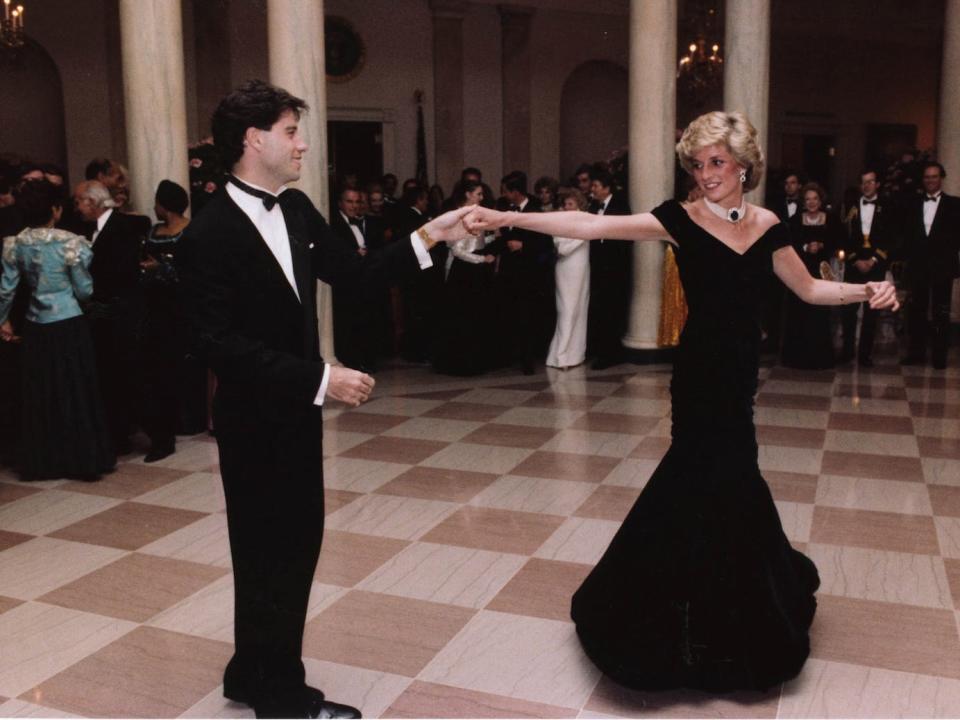 In this Nov. 9, 1985 photo provided by the Ronald Reagan Library, actor John Travolta dances with Princess Diana at a White House dinner in Washington. Since strutting onto the big screen in “Saturday Night Fever,” John Travolta’s career has been one of dramatic ups and downs, from comeback king to Internet meme. Travolta, 61, is prepping a handful of projects and ahead of the release of an explosive documentary on Scientology that focuses considerably on Travolta’s relationship with the organization.