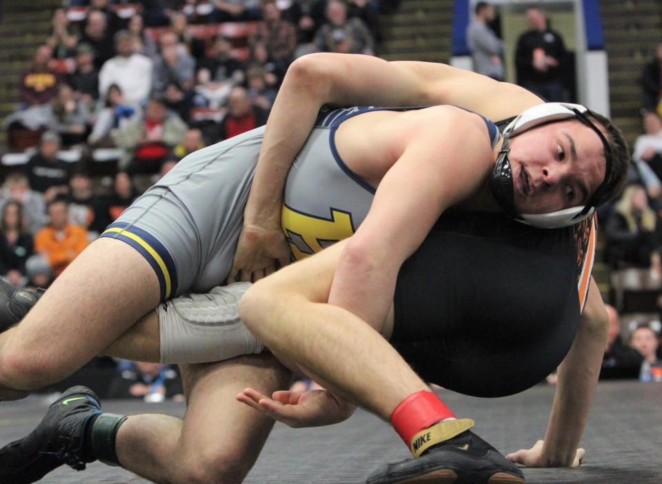 Hartland's Vinnie Abbey got a pin in a state semifinal victory over Rockford on Saturday, Feb. 25, 2023 at Wings Event Center.