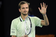 Daniil Medvedev of Russia celebrates after defeating Stefanos Tsitsipas of Greece in their semifinal match at the Australian Open tennis championships in Melbourne, Australia, Friday, Jan. 28, 2022.(AP Photo/Andy Brownbill)