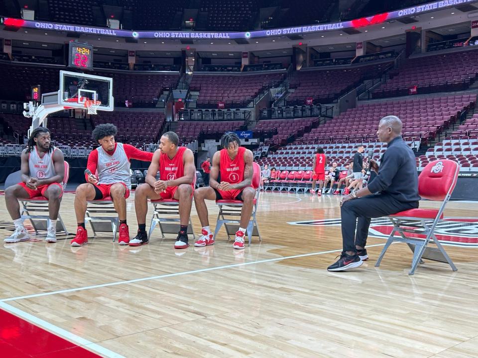 Ohio State's Isaac Likekele, Justice Sueing, Zed Key and Gene Brown III (L-R) take questions from alumnus Ron Stokes at an open practice Oct. 10, 2022 at Value City Arena.