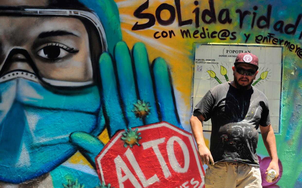 Graffiti in Mexico City urging people to stop attacking health workers - Barcroft Media