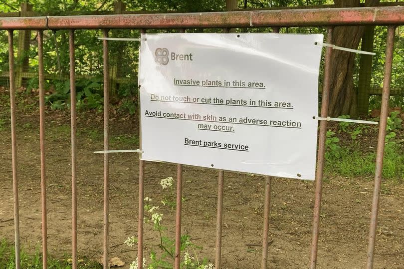 Brent Council warning sign put up on the fence in a park
