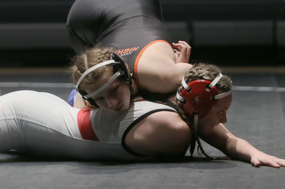 Leah Stagg was a senior leader and one of five Ames individuals to qualify for the first IGHSAU sanctioned girls state wrestling meet in 2022-2023.