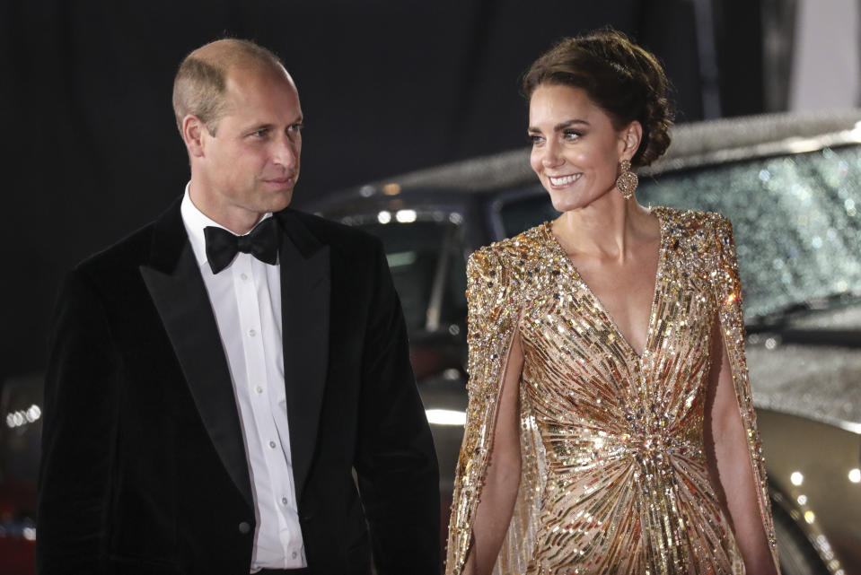 Britain's Prince William, left, and his wife Kate the Duchess of Cambridge arrive for the World premiere of the new film from the James Bond franchise 'No Time To Die', in London Tuesday, Sept. 28, 2021. (Photo by Vianney Le Caer/Invision/AP)